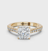 Yellow gold Cushion Cut Solitaire Diamond Engagement Ring with Pave Band and Four-Prong Setting