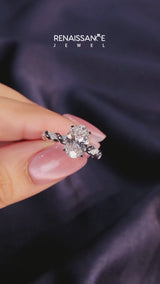 Silver Oval Cut Diamond Solitaire Ring with Twisted Band and Pavé Accents