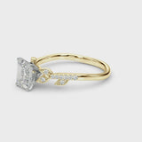 Yellow gold Emerald Solitaire Leaf-Inspired Diamond Ring with Pavé Band and Four-Prong Setting