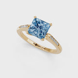 Yellow gold Fancy Blue Princess  Cut Channel Set Solitaire Engagement Ring with Four-Prong Setting