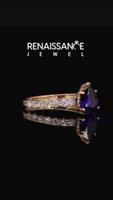 Rose gold Pear Cut Blue Sapphire Solitaire Ring with Round  Pavé Band and Four-Prong Setting