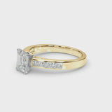 Yellow gold Emerald Solitaire Diamond Ring with Channel-Set Band and Four-Prong Setting