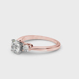 Rose gold Three-Stone Round Solitaire Ring with Tapered Band and Four-Prong Setting