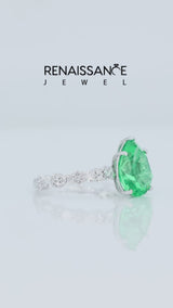 Silver Pear Cut Green Sapphire Side Stone Solitaire Ring with Round and Four-Prong Setting