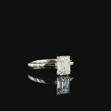White gold Emerald Solitaire Engagement Ring with Cathedral Band and Four-Prong Setting