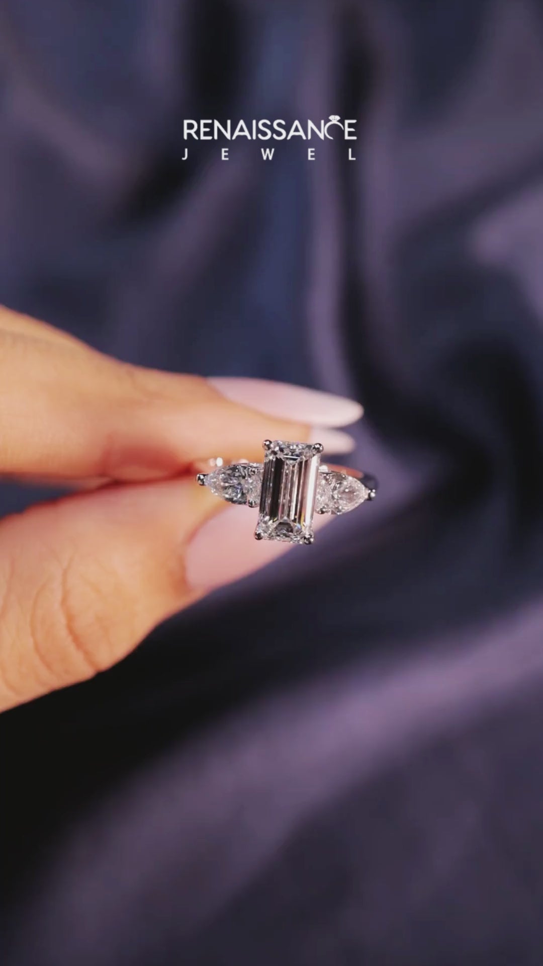 Platinum Three-Stone Emerald Cut Diamond Ring with Pear Side Stones on a Platinum Band and Four-Prong Setting 6