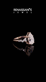 Rose gold Pear Cut Moissanite Scattered Round Accent Ring with Prong Setting