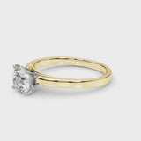 Yellow gold Heart Solitaire Diamond Engagement Ring with Four-Prong Setting on a Classic Band