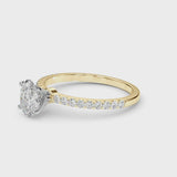 Yellow gold Oval Cut Diamond Solitaire Ring with Pavé Accents and Four-Prong Setting