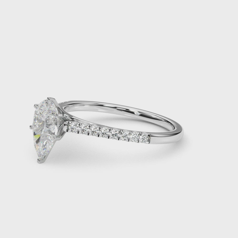 Silver Pear Cut Solitaire Diamond Ring with Pave Band and Four-Prong Setting 3