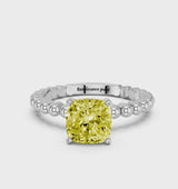 Platinum Fancy Yellow Cushion Cut Diamond Solitaire Ring with Beaded Band and Prong Setting