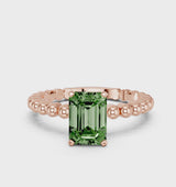 Rose gold Fancy Green Emerald Cut Diamond Solitaire Ring with Beaded Band and Prong Setting