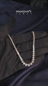 Yellow gold Round Brilliant Graduated Diamond Tennis Necklace with Four-Prong Setting