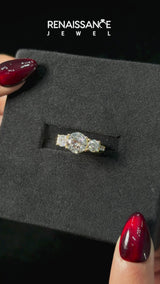 Yellow gold Radiant Cut Diamond Three-Stone Ring with Channel Set Band and Four-Prong Setting