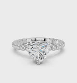 Platinum Heart Cut Diamond Solitaire Ring with Beaded Band and Prong Setting