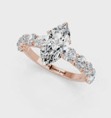 Rose gold Marquise Cut Diamond Prong Setting with Side Stones on a Pave Band