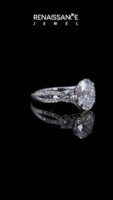 White gold Oval Cut Diamond Three-Stone Ring with Pavé Split Shank and Four-Prong Setting