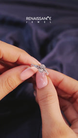 Silver Oval Cut Diamond Solitaire Engagement Ring with Twisted Pavé Band and Four-Prong Setting