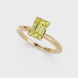 Yellow gold Fancy Yellow Emerald Cut Diamond Solitaire Ring with Six-Prong Setting and Classic Band