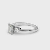 White gold Three-Stone Emerald Solitaire Ring with Tapered Band and Four-Prong Setting