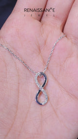 Silver Infinity Pendant with Round Brilliant Diamonds in Pavé Setting