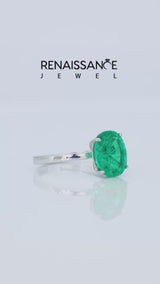 Silver Oval Cut Emerald Solitaire Engagement Ring with Classic Band and Four-Prong Setting