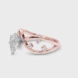 Rose gold Pear Cut Solitaire Diamond with Side Stones on Criss-Cross Band and Four-Prong Setting