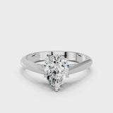 White gold Pear Cut Diamond Solitaire Engagement Ring with Cathedral Setting and Four-Prong Mount