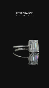 Silver Emerald Cut Moissanite Solitaire Engagement Ring with Round Band and Four-Prong Setting