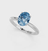 Platinum Fancy Blue Oval Cut Diamond Solitaire Ring with Six-Prong Setting and Classic Band