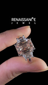 Platinum Fancy Pink Emerald  Diamond Three-Stone Ring with Trapezoid Side Stones and Prong Setting