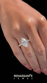 Yellow gold Marquise Cut Diamond Side Stone Solitaire Ring with Round  and Four-Prong Setting