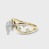 Yellow gold Pear Cut Solitaire Diamond with Side Stones on Criss-Cross Band and Four-Prong Setting