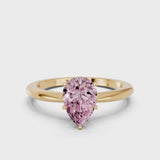 Yellow gold Fancy Pink Pear Cut Diamond Solitaire Ring with Six-Prong Setting and Classic Band
