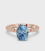 Rose gold Fancy Blue Oval Cut Diamond Solitaire Ring with Beaded Band and Prong Setting
