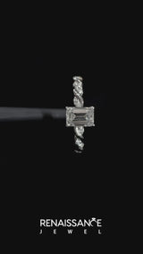 Platinum Emerald Cut Diamond Solitaire Ring with Twisted Band and Pavé Accents
