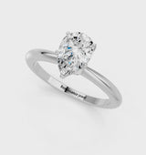 White gold Pear Cut Diamond Solitaire Ring with Six-Prong Setting and Classic Band