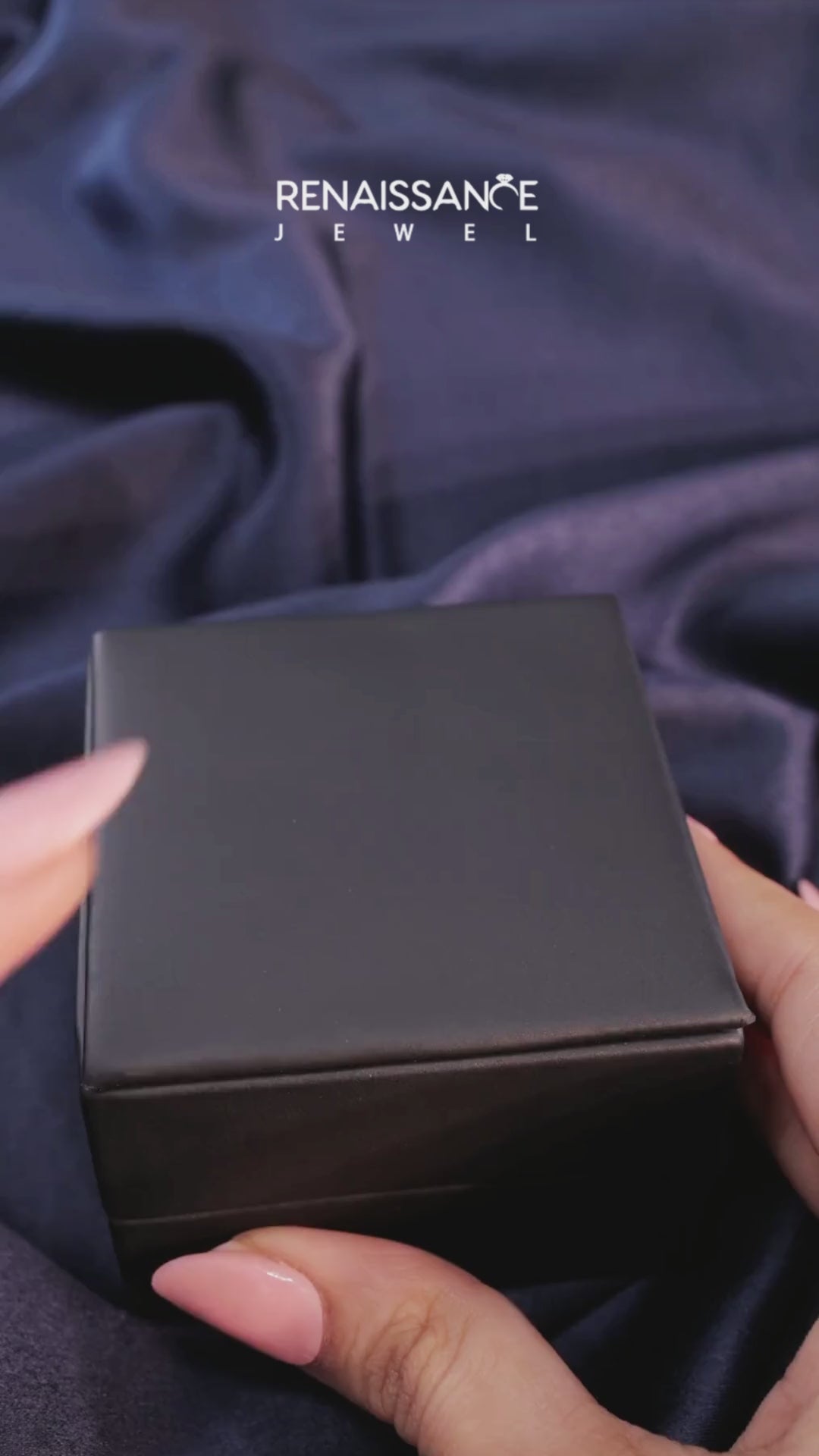 White gold Emerald Solitaire with Tapered Baguette Side Stones on a Classic Band with Four-Prong Setting 7