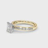 Yellow gold Emerald Solitaire Diamond Ring with Channel-Set Baguette Band and Four-Prong Setting