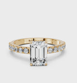 Yellow gold Emerald Cut Diamond Solitaire Pavé Band with Four-Prong Setting