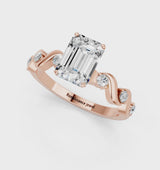 Rose gold Emerald Solitaire Twisted Band with Prong Setting