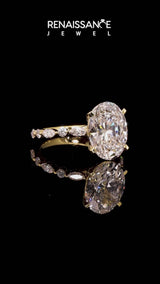 Yellow gold Oval Cut Diamond Ring with Marquise and Round  Side Stones and Four-Prong Setting