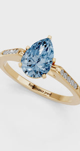 Yellow gold Fancy Blue Pear  Cut Channel Set Solitaire Engagement Ring with Four-Prong Setting
