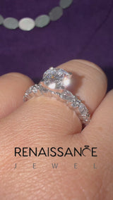 White gold Round Cut Diamond Side Stone Solitaire Ring with Round  and Four-Prong Setting