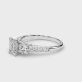 Platinum Three-Stone Emerald Cut Diamond Pavé Band with Four-Prong Setting