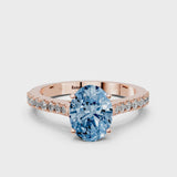 Rose gold Fancy Blue Oval  Cut Solitaire Diamond Engagement Ring with Pave Band and Four-Prong Setting