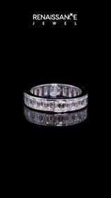 White gold emerald cut diamond eternity band with channel set