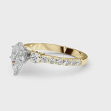 Yellow gold Pear Cut Diamond Solitaire Ring with Four-Prong Setting and Twisted Pavé Band