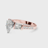 Rose gold Pear Cut Diamond Engagement Ring with Baguette Side Stones and Channel Set Band