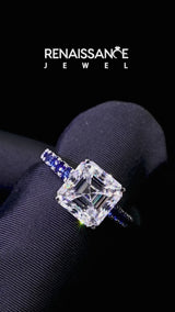 Silver Asscher Cut Diamond Cathedral Solitaire Ring with Round with Blue Sapphire side stone Pavé Band